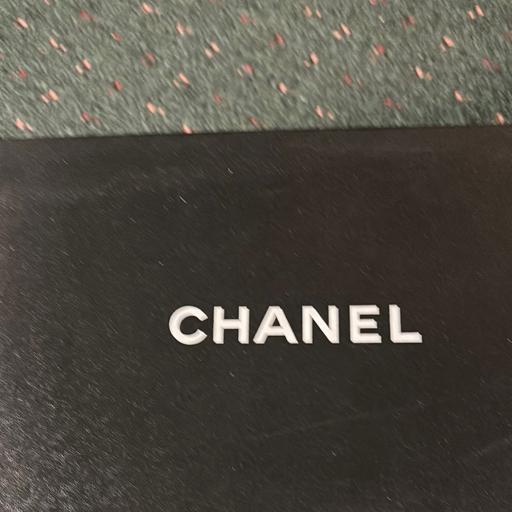 CHANEL Elegant Black Leather Piece